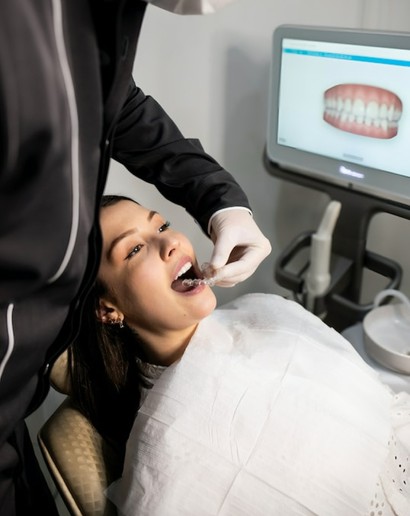 woman getting checked in dental office